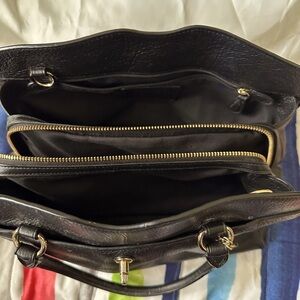 Coach very soft leather. Great Condition. Handles and shoulder strap. Dividers